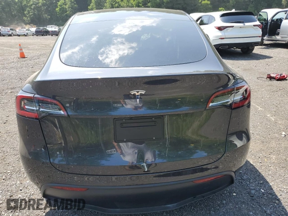 2024 Tesla Model Y с VIN 7SAYGDED1RF092027, выставлен на аукционе Copart как лот 62330775 с пробегом 22 010 миль миль и Списание • Salvage title. История ставок и продаж доступна на DreamBid. Изображение 6.