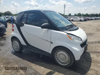 2015 Smart fortwo Passion with VIN WMEEJ3BA6FK819930, listed as a Copart auction lot 64722495 with 106,124 mi miles and Clean title. Bid and sale history available at DreamBid. Image 4.