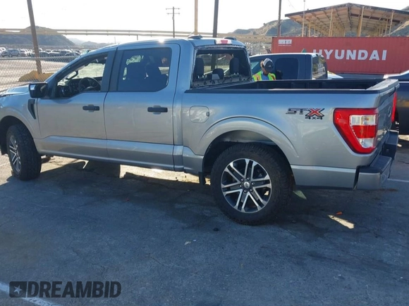2023 Ford F-150 XL with VIN 1FTFW1E55PKD57059, listed as a IAAI auction lot 41625898 with 49,882 mi miles. Bid and sale history available at carsss.com. Image 3.