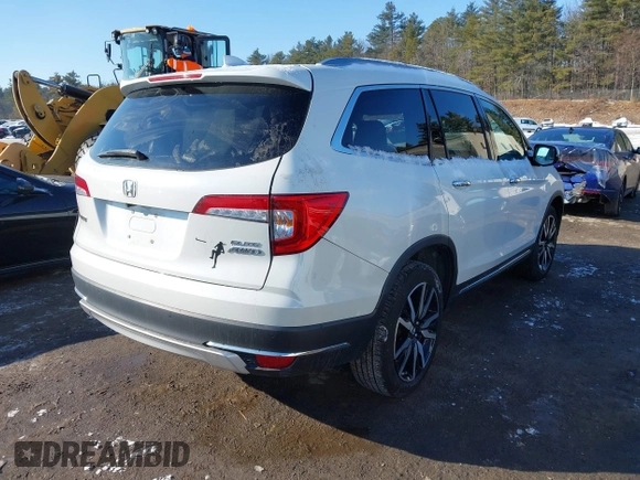 2020 Honda Pilot Elite with VIN 5FNYF6H09LB039247, listed as a IAAI auction lot 41364383 with 56,865 mi miles and . Bid and sale history available at DreamBid. Image 4.