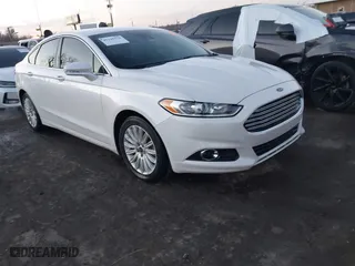 2014 Ford Fusion Energi Titanium with VIN 3FA6P0SU8ER269351, listed as a IAAI auction lot 41145570 with 122,128 mi miles. Bid and sale history available at carsss.com. Image 1.