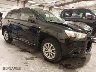 2011 Mitsubishi Outlander Sport ES with VIN JA4AP3AU8BZ002333, listed as a IAAI auction lot 41823067 with 121,794 mi miles. Bid and sale history available at carsss.com. Image 1.