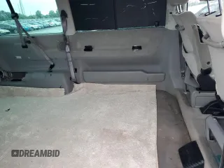 2003 Volkswagen EuroVan с VIN WV2KB47093H041606, выставлен на аукционе Copart как лот 73808224 с пробегом 228 496 миль миль и Чистый • Clean title. История ставок и продаж доступна на DreamBid. Изображение 11.