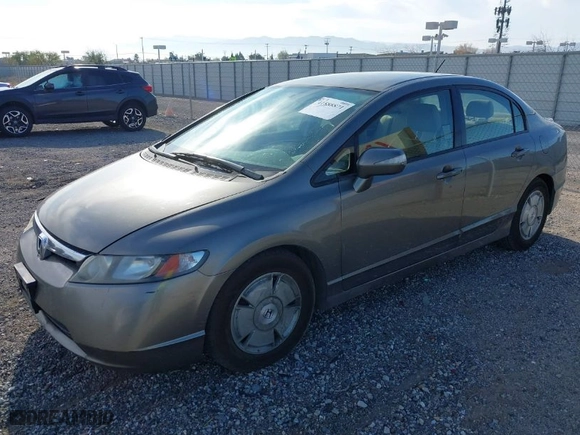2007 Honda Civic Hybrid with VIN JHMFA36257S011770, listed as a IAAI auction lot 41888871 with 205,583 mi miles. Bid and sale history available at carsss.com. Image 2.