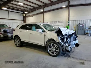2025 Cadillac XT5 FWD Premium Luxury with VIN 1GYKNCRSXSZ106707, listed as a Copart auction lot 86919854 with 1,879 mi miles and Salvage Title. Bid and sale history available at DreamBid. Image 12.