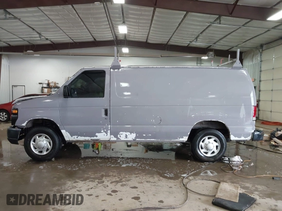 2014 Ford Econoline Cargo Commercial with VIN 1FTNE2EW4EDA64221, listed as a IAAI auction lot 41628147 with 190,018 mi miles and . Bid and sale history available at DreamBid. Image 14.