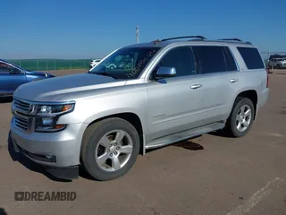 2015 Chevrolet Tahoe LTZ with VIN 1GNSKCKC5FR205739, listed as a IAAI auction lot 40020644 with 142,524 mi miles and . Bid and sale history available at DreamBid. Image 17.