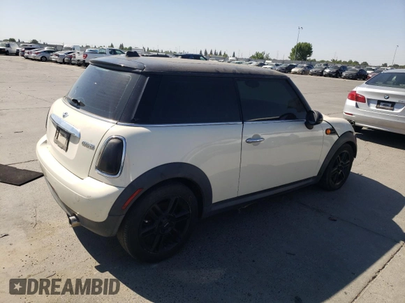 2012 MINI Hardtop with VIN WMWSU3C58CT186490, listed as a Copart auction lot 56052095 with 114,596 mi miles and Clean Title. Bid and sale history available at DreamBid. Image 3.