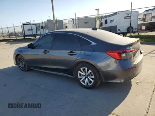 2022 Honda Civic LX z VIN 2HGFE2F26NH517811, wystawiony jako Copart lot #52933645 z przebiegiem Nie podano mil oraz Szkoda całkowita • Salvage title. Historia ofert i sprzedaży dostępna na DreamBid. Obrazek 2.