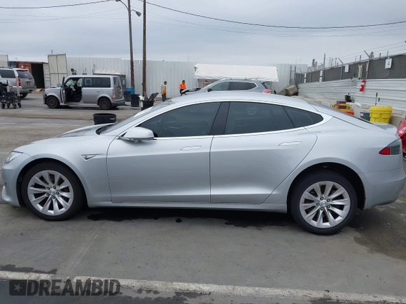 2016 Tesla Model S 90D with VIN 5YJSA1E23GF138925, listed as a IAAI auction lot 42408676 with 48,399 mi miles and . Bid and sale history available at DreamBid. Image 14.