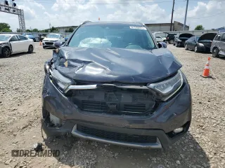 2018 Honda CR-V Touring with VIN 2HKRW2H9XJH605264, listed as a Copart auction lot 61500315 with 106,616 mi miles and Salvage title. Bid and sale history available at DreamBid. Image 5.