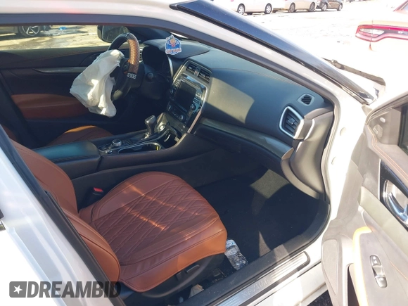 2020 Nissan Maxima Platinum with VIN 1N4AA6FV1LC381227, listed as a IAAI auction lot 41274787 with 85,788 mi miles and . Bid and sale history available at DreamBid. Image 5.