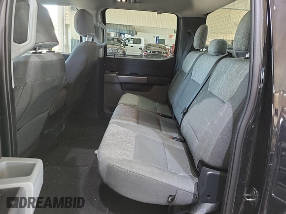 2021 Ford F-150 XL with VIN 1FTFW1E52MFB64744, listed as a IAAI auction lot 42733866 with 98,411 mi miles and . Bid and sale history available at DreamBid. Image 6.