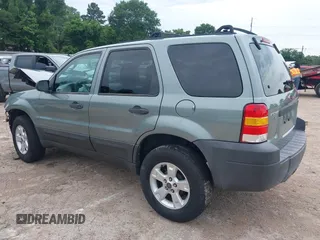 2006 Ford Escape XLT with VIN 1FMYU03146KD35945, listed as a IAAI auction lot 42337712 with 159,833 mi miles and . Bid and sale history available at DreamBid. Image 3.