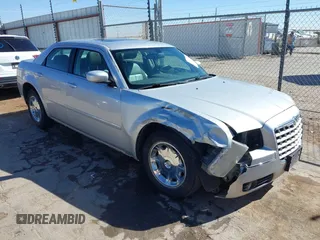 2006 Chrysler 300 Touring with VIN 2C3KA53G86H111027, listed as a IAAI auction lot 41870312 with 59,870 mi miles. Bid and sale history available at carsss.com. Image 1.