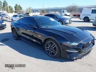 2021 Ford Mustang GT z VIN 1FA6P8CF6M5149175, wystawiony jako IAAI lot #41798328 z przebiegiem 61 776 mil mil oraz . Historia ofert i sprzedaży dostępna na DreamBid. Obrazek 1.