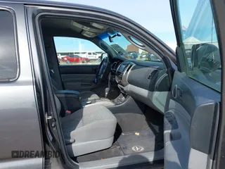 2014 Toyota Tacoma PreRunner with VIN 3TMJU4GN1EM156845, listed as a IAAI auction lot 40972570 with 65,138 mi miles. Bid and sale history available at carsss.com. Image 5.