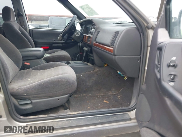 1998 Jeep Grand Cherokee Laredo with VIN 1J4FX58S6WC354101, listed as a IAAI auction lot 42158671 with 289,318 mi miles and . Bid and sale history available at DreamBid. Image 5.