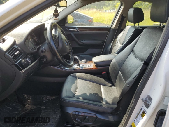2015 BMW X4 xDrive28i with VIN 5UXXW3C51F0M89005, listed as a Copart auction lot 57392984 with 142,385 mi miles. Bid and sale history available at carsss.com. Image 7.