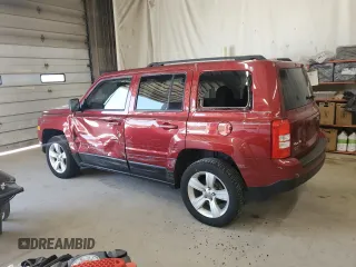 2014 Jeep Patriot Latitude with VIN 1C4NJRFB2ED734624, listed as a Copart auction lot 60675175 with 91,624 mi miles and Salvage title. Bid and sale history available at DreamBid. Image 2.