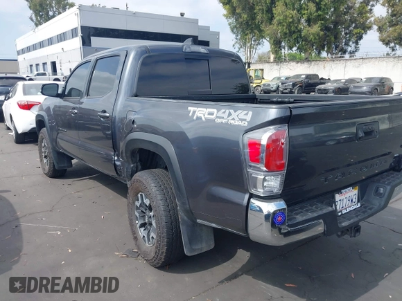 2023 Toyota Tacoma SR with VIN 3TMCZ5AN0PM635933, listed as a IAAI auction lot 42543126 with 32,960 mi miles and . Bid and sale history available at DreamBid. Image 3.
