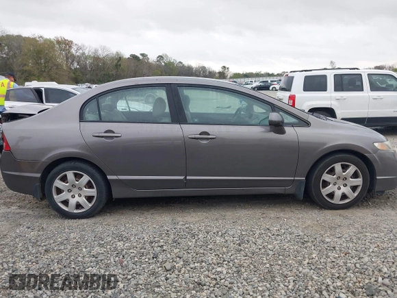 2009 Honda Civic LX z VIN 1HGFA16539L005299, wystawiony jako IAAI lot #41848263 z przebiegiem 169 019 mil mil oraz . Historia ofert i sprzedaży dostępna na DreamBid. Obrazek 13.