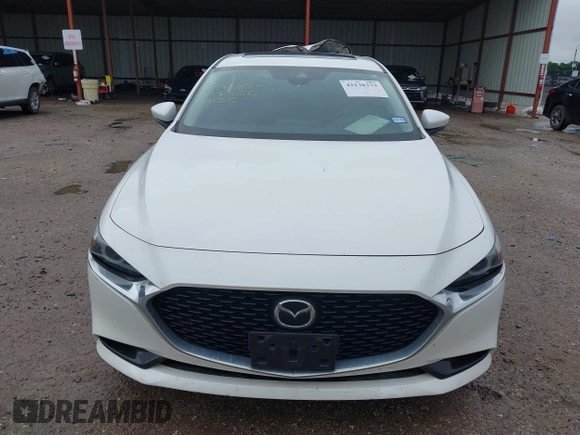 2023 Mazda 3 S Premium with VIN 3MZBPBDM6PM371326, listed as a IAAI auction lot 42138373 with 24,865 mi miles and . Bid and sale history available at DreamBid. Image 12.