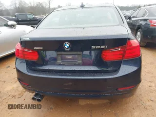 2013 BMW 3 Series 328i xDrive with VIN WBA3B3C54DF536675, listed as a IAAI auction lot 41185325 with 90,296 mi miles and . Bid and sale history available at carsss.com. Image 16.