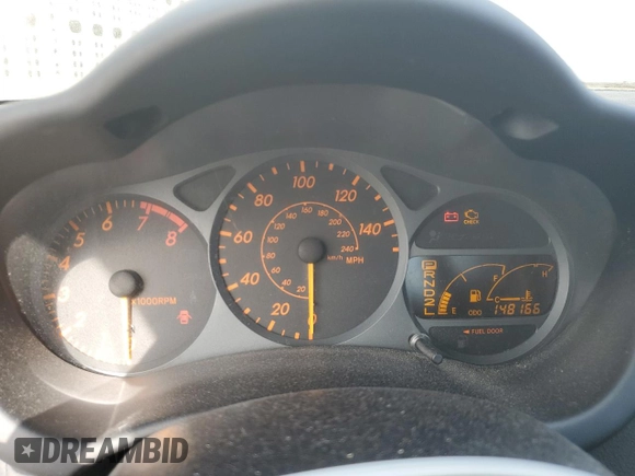 2004 Toyota Celica GT z VIN JTDDR32T840174372, wystawiony jako Copart lot #88220105 z przebiegiem 148 166 mil mil oraz Szkoda całkowita • Salvage title. Historia ofert i sprzedaży dostępna na DreamBid. Obrazek 9.