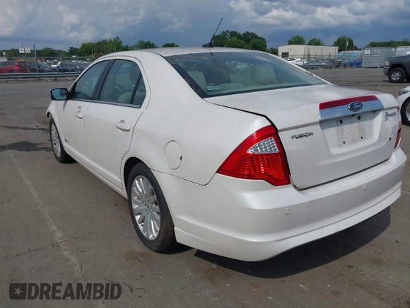 2012 Ford Fusion Hybrid с VIN 3FADP0L39CR216555, выставлен на аукционе IAAI как лот 42506669 с пробегом 171 346 миль миль и . История ставок и продаж доступна на DreamBid. Изображение 3.