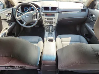 2012 Ford Fusion SE z VIN 3FAHP0HA7CR387524, wystawiony jako Copart lot #62083235 z przebiegiem 104 698 mil mil oraz Szkoda całkowita • Salvage title. Historia ofert i sprzedaży dostępna na DreamBid. Obrazek 8.
