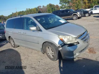 2006 Honda Odyssey EX z VIN 5FNRL38416B441430, wystawiony jako IAAI lot #40630386 z przebiegiem 240 243 mil mil oraz . Historia ofert i sprzedaży dostępna na DreamBid. Obrazek 1.