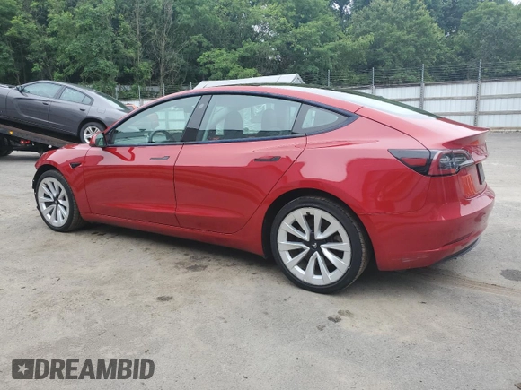 2023 Tesla Model 3 with VIN 5YJ3E1EA6PF437390, listed as a Copart auction lot 62825135 with 115,121 mi miles and Clean title. Bid and sale history available at DreamBid. Image 2.