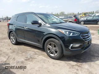 2017 Hyundai Santa Fe 2.4L z VIN 5NMZU3LB5HH016054, wystawiony jako IAAI lot #42139561 z przebiegiem 107 633 mil mil oraz . Historia ofert i sprzedaży dostępna na DreamBid. Obrazek 1.
