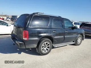 2003 Cadillac Escalade z VIN 1GYEC63T63R317510, wystawiony jako Copart lot #48515195 z przebiegiem 398 303 mil mil oraz Czysty tytuł • Clean title. Historia ofert i sprzedaży dostępna na DreamBid. Obrazek 3.