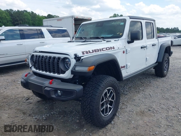 2024 Jeep Gladiator Rubicon z VIN 1C6JJTBG5RL110865, wystawiony jako IAAI lot #42104829 z przebiegiem 6 815 mil mil oraz . Historia ofert i sprzedaży dostępna na DreamBid. Obrazek 2.