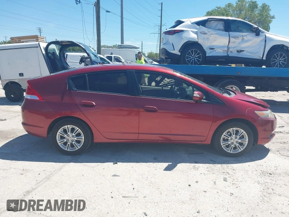 2010 Honda Insight EX with VIN JHMZE2H71AS021062, listed as a IAAI auction lot 41857350 with 45,558 mi miles and . Bid and sale history available at carsss.com. Image 14.