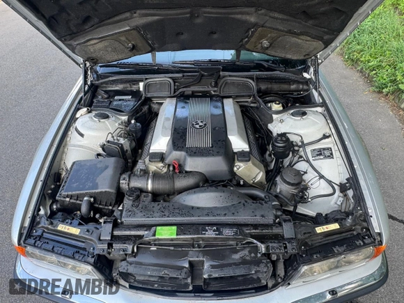 2000 BMW 7 Series 740i with VIN WBAGG8348YDN75777, listed as a Copart auction lot 65038165 with 119,506 mi miles and Clean title. Bid and sale history available at DreamBid. Image 7.