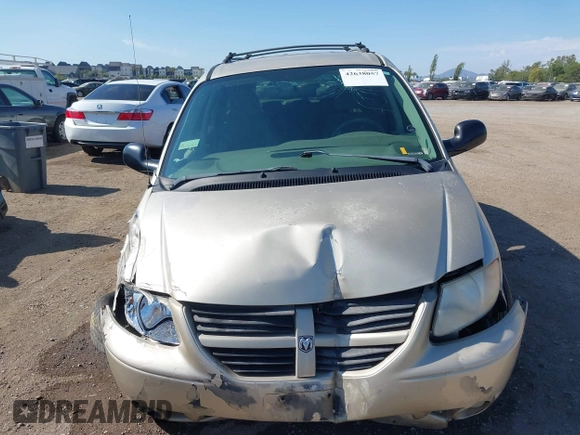 2005 Dodge Caravan SXT with VIN 2D8GP44L05R459369, listed as a IAAI auction lot 42638057 with 76,777 mi miles and . Bid and sale history available at DreamBid. Image 12.