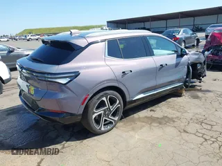 2025 Chevrolet Equinox EV LT z VIN 3GN7DLRP6SS145485, wystawiony jako IAAI lot #42014380 z przebiegiem 912 mil mil oraz . Historia ofert i sprzedaży dostępna na DreamBid. Obrazek 4.