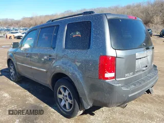 2010 Honda Pilot Touring with VIN 5FNYF4H93AB008589, listed as a IAAI auction lot 41731084 with 138,554 mi miles and . Bid and sale history available at carsss.com. Image 3.