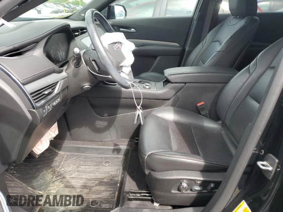 2019 Cadillac XT4 FWD Premium Luxury z VIN 1GYFZCR4XKF100124, wystawiony jako Copart lot #54249845 z przebiegiem 39 644 mil mil oraz Szkoda całkowita • Salvage title. Historia ofert i sprzedaży dostępna na DreamBid. Obrazek 7.