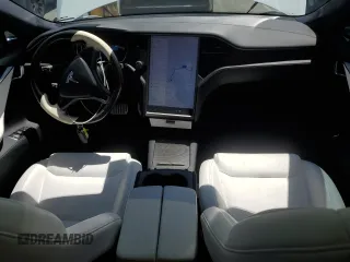 2020 Tesla Model S Performance with VIN 5YJSA1E42LF401157, listed as a Copart auction lot 55082875 with 60,376 mi miles and Salvage title. Bid and sale history available at DreamBid. Image 8.
