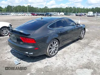 2013 Audi A7 Prestige with VIN WAU2GAFC8DN121215, listed as a IAAI auction lot 42246162 with 123,283 mi miles and . Bid and sale history available at DreamBid. Image 4.