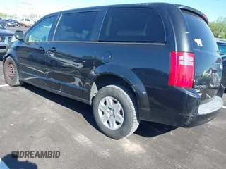 2009 Dodge Grand Caravan SE z VIN 2D8HN44EX9R623373, wystawiony jako IAAI lot #41967398 z przebiegiem 225 611 mil mil oraz . Historia ofert i sprzedaży dostępna na DreamBid. Obrazek 3.