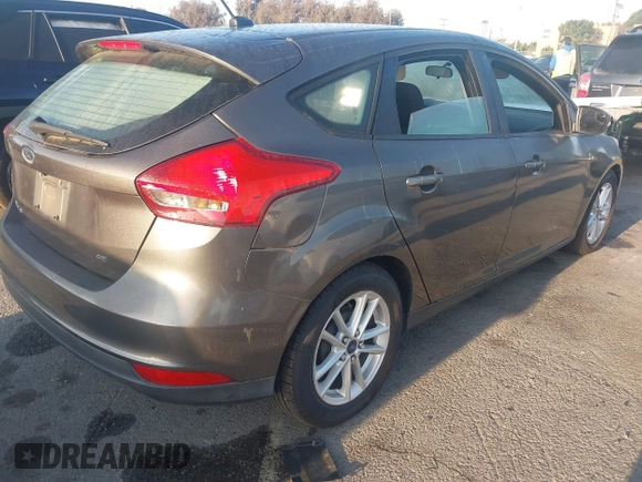 2015 Ford Focus SE with VIN 1FADP3K26FL342515, listed as a IAAI auction lot 41981596 with 112,470 mi miles. Bid and sale history available at carsss.com. Image 4.