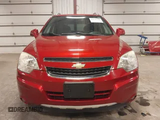 2014 Chevrolet Captiva Sport LT z VIN 3GNAL3EK2ES609279, wystawiony jako IAAI lot #42135344 z przebiegiem 46 330 mil mil oraz . Historia ofert i sprzedaży dostępna na DreamBid. Obrazek 13.