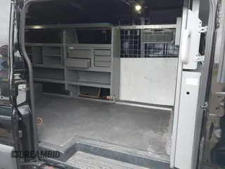 2017 Ford Transit with VIN 1FTYR2YM2HKB57718, listed as a IAAI auction lot 42000328 with 59,338 mi miles and . Bid and sale history available at DreamBid. Image 8.