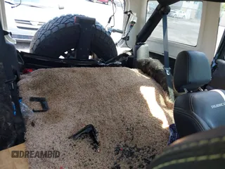 2017 Jeep Wrangler Unlimited Rubicon Recon with VIN 1C4BJWFG7HL525709, listed as a IAAI auction lot 42569577 with 119,560 mi miles and . Bid and sale history available at DreamBid. Image 8.
