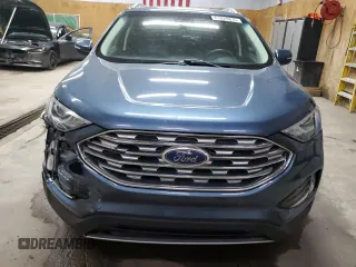 2019 Ford Edge SEL z VIN 2FMPK4J96KBB12912, wystawiony jako Copart lot #61029835 z przebiegiem 93 474 mil mil oraz Czysty tytuł • Clean title. Historia ofert i sprzedaży dostępna na DreamBid. Obrazek 5.